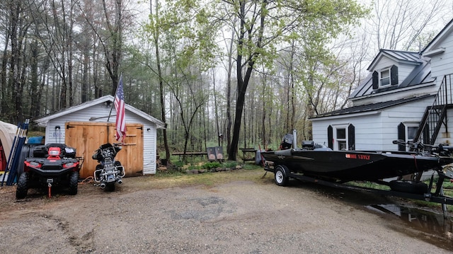 1 Nichols St, Bath, ME 04530 - view of property exterior featuring metal roof and an outbuilding