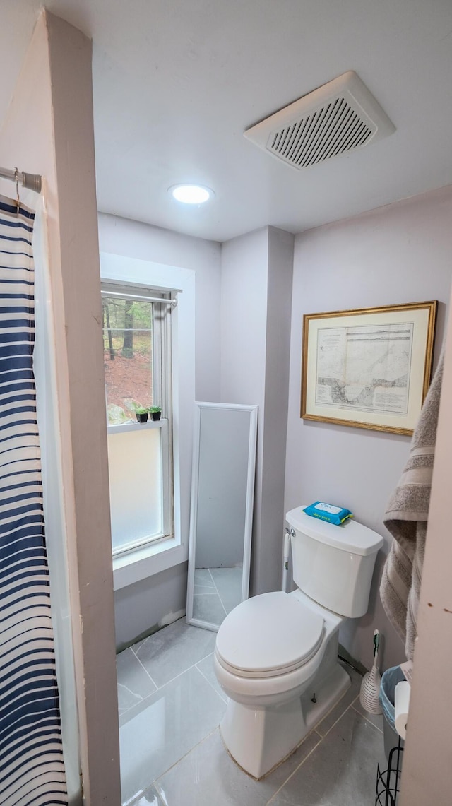 1 Nichols St, Bath, ME 04530 - full bath featuring toilet, a stall shower, and tile patterned flooring