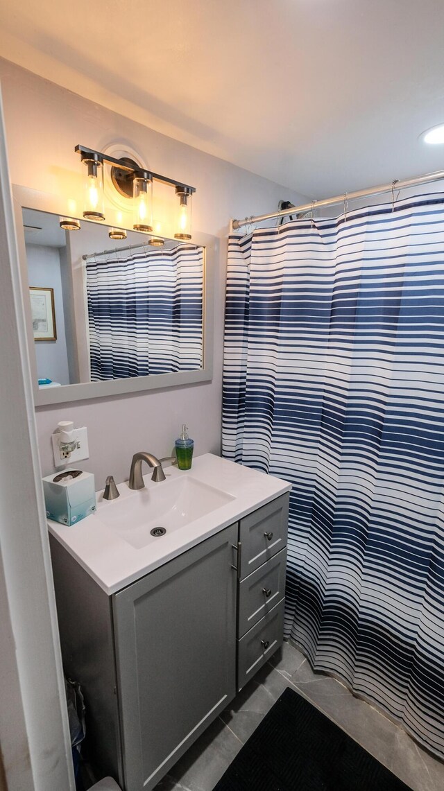 1 Nichols St, Bath, ME 04530 - bathroom with vanity, a shower with shower curtain, and tile patterned floors