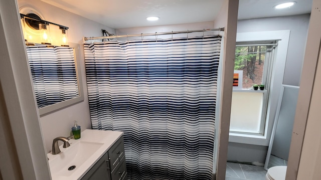 1 Nichols St, Bath, ME 04530 - full bath featuring vanity, toilet, curtained shower, tile patterned flooring, and recessed lighting