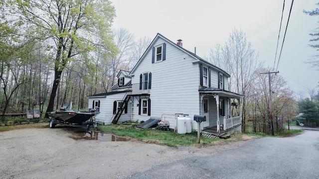 1 Nichols St, Bath, ME 04530 - view of property exterior featuring a chimney and a porch