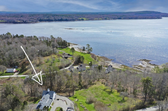 45 Sandy Point Rd, Stockton Springs, ME 04981 - aerial view of property and surrounding area featuring a nearby body of water and a heavily wooded area