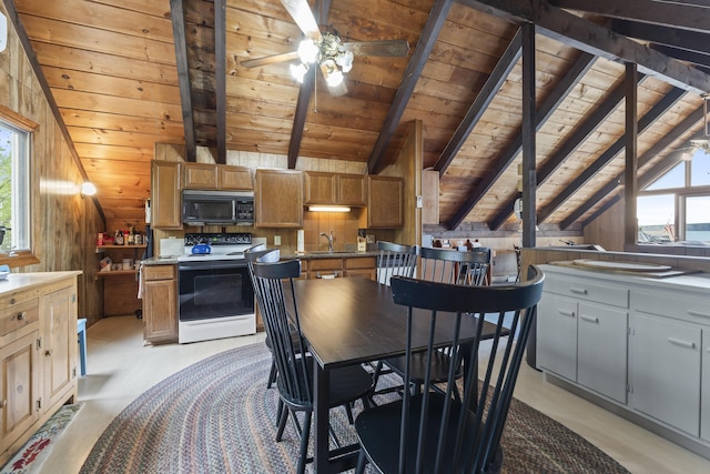 489 Leisure Ln, Frye Island, ME 04071 - dining room featuring wood ceiling, a ceiling fan, and wooden walls