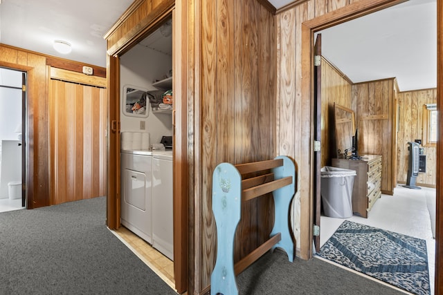 489 Leisure Ln, Frye Island, ME 04071 - hall featuring wood walls, separate washer and dryer, and light colored carpet