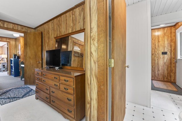 489 Leisure Ln, Frye Island, ME 04071 - bedroom with wood walls, light flooring, and crown molding