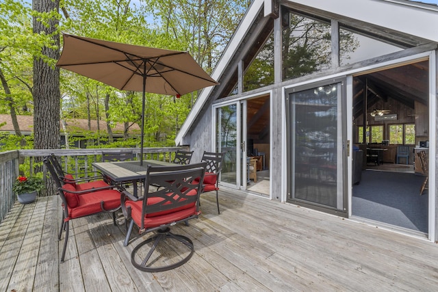 489 Leisure Ln, Frye Island, ME 04071 - wooden terrace featuring outdoor dining area