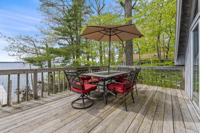 489 Leisure Ln, Frye Island, ME 04071 - wooden deck with outdoor dining space and a water view
