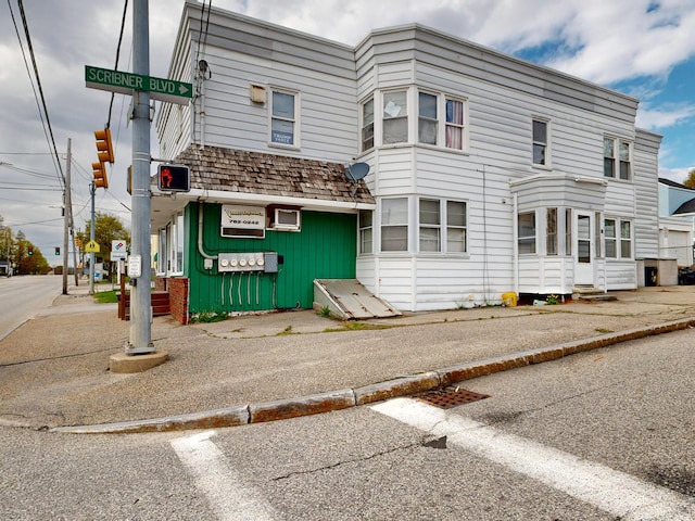 view of building exterior with entry steps