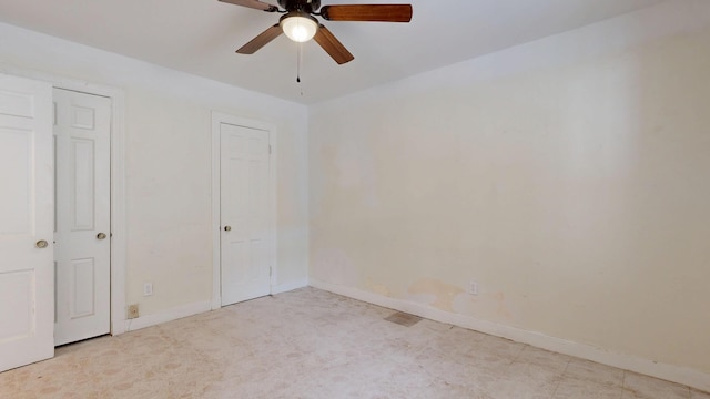 unfurnished bedroom with baseboards and ceiling fan