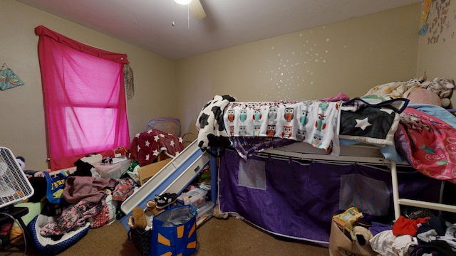carpeted bedroom featuring a ceiling fan