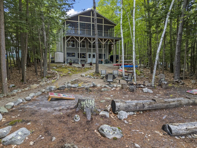 186 Ridge Rd, Frye Island, ME 04071 - rear view of property with a wooden deck