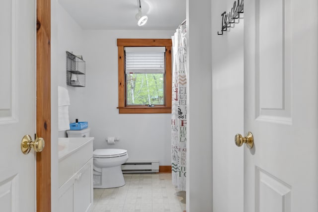 186 Ridge Rd, Frye Island, ME 04071 - full bath with baseboard heating, vanity, toilet, and a shower with curtain