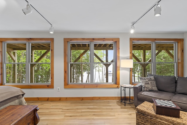 186 Ridge Rd, Frye Island, ME 04071 - sunroom / solarium featuring rail lighting and healthy amount of natural light