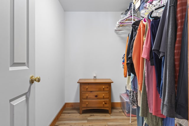 186 Ridge Rd, Frye Island, ME 04071 - walk in closet featuring wood finished floors