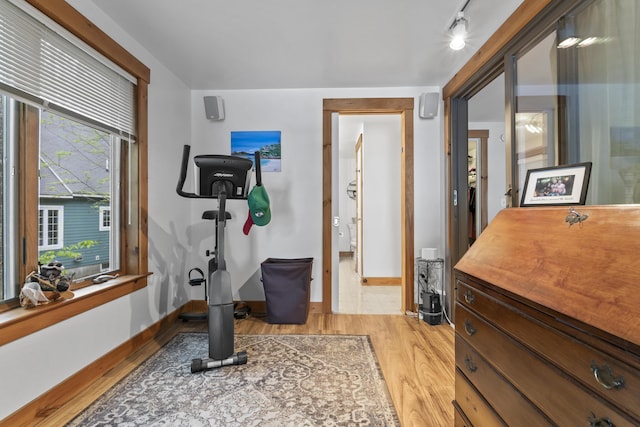 186 Ridge Rd, Frye Island, ME 04071 - workout area with light wood-type flooring and baseboards