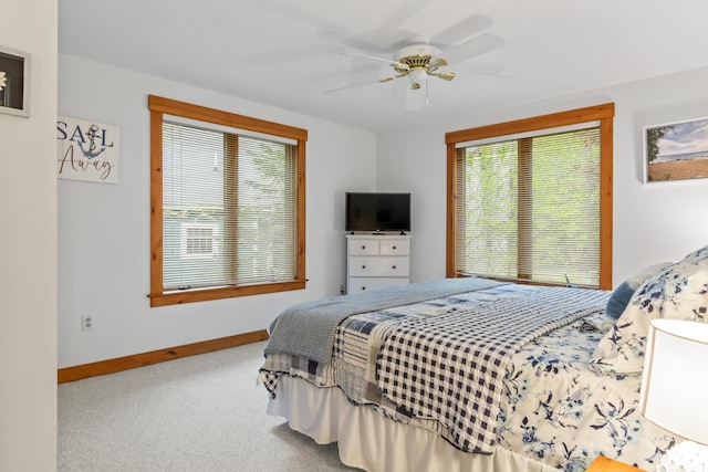 186 Ridge Rd, Frye Island, ME 04071 - bedroom with baseboards, carpet flooring, and ceiling fan