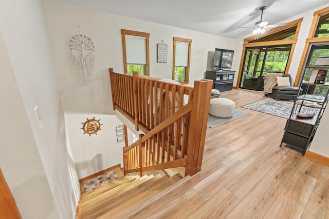 186 Ridge Rd, Frye Island, ME 04071 - stairs featuring hardwood / wood-style floors and a ceiling fan