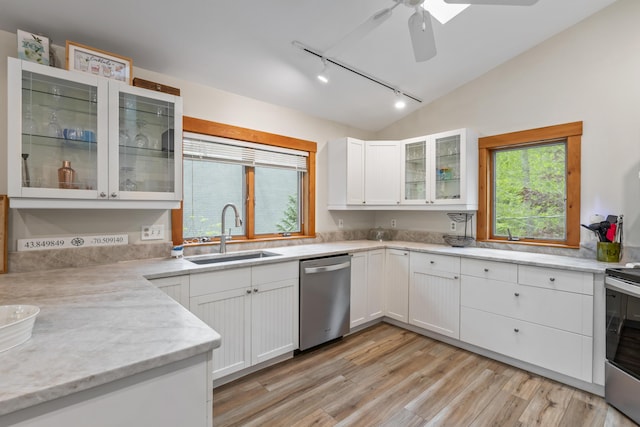 186 Ridge Rd, Frye Island, ME 04071 - kitchen with appliances with stainless steel finishes, a sink, track lighting, lofted ceiling, and ceiling fan