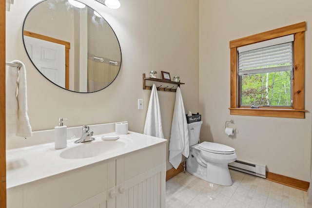 186 Ridge Rd, Frye Island, ME 04071 - bathroom with a baseboard radiator, baseboards, vanity, and toilet