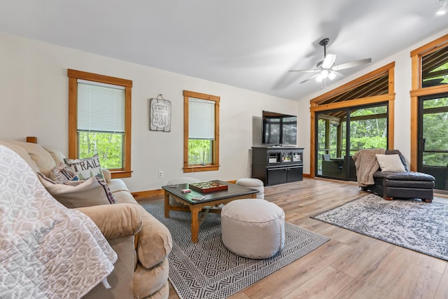 186 Ridge Rd, Frye Island, ME 04071 - living area featuring wood finished floors, a ceiling fan, and vaulted ceiling