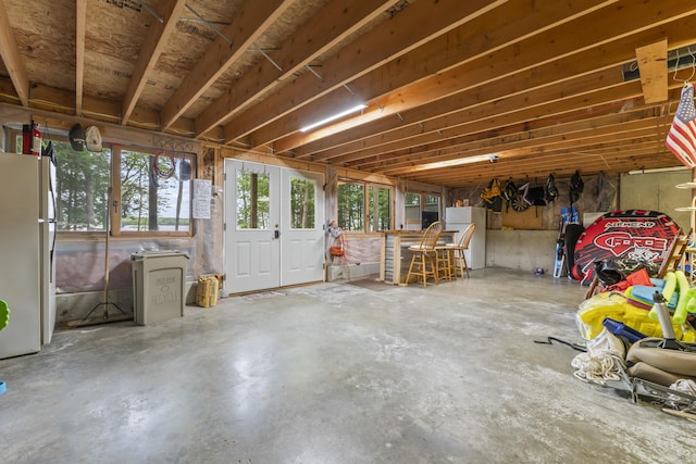 186 Ridge Rd, Frye Island, ME 04071 - misc room featuring unfinished concrete floors and healthy amount of natural light