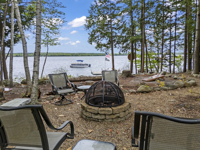 186 Ridge Rd, Frye Island, ME 04071 - view of yard with an outdoor fire pit and a water view