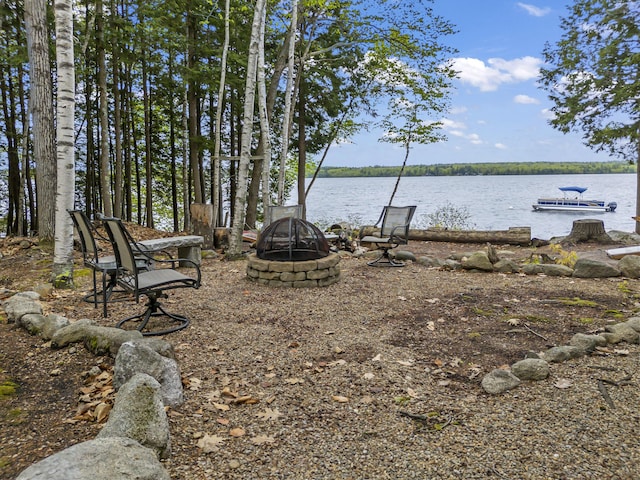 186 Ridge Rd, Frye Island, ME 04071 - view of yard featuring an outdoor fire pit and a water view