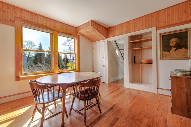 6 Sea St, Northeast Harbor, Mount Desert, ME 04662 - dining room featuring stairway, light wood finished floors, baseboards, and built in shelves