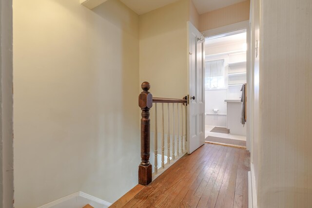 6 Sea St, Northeast Harbor, Mount Desert, ME 04662 - hall with an upstairs landing, wood-type flooring, and baseboards