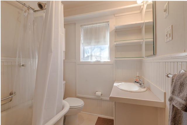 6 Sea St, Northeast Harbor, Mount Desert, ME 04662 - full bath with a wainscoted wall, toilet, vanity, and a decorative wall