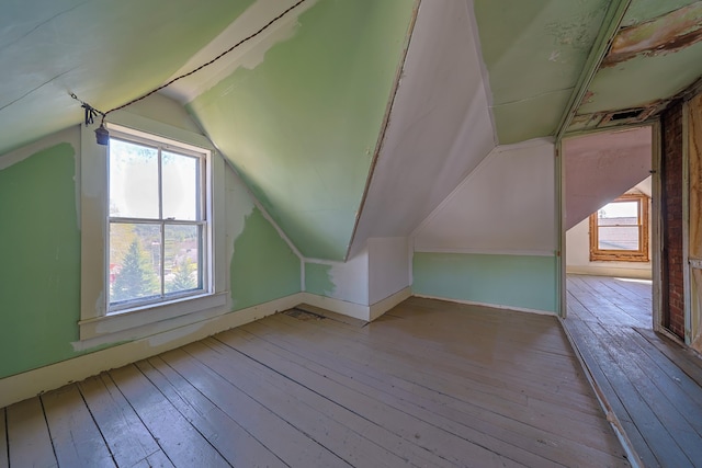 6 Sea St, Northeast Harbor, Mount Desert, ME 04662 - additional living space with vaulted ceiling, hardwood / wood-style flooring, and baseboards