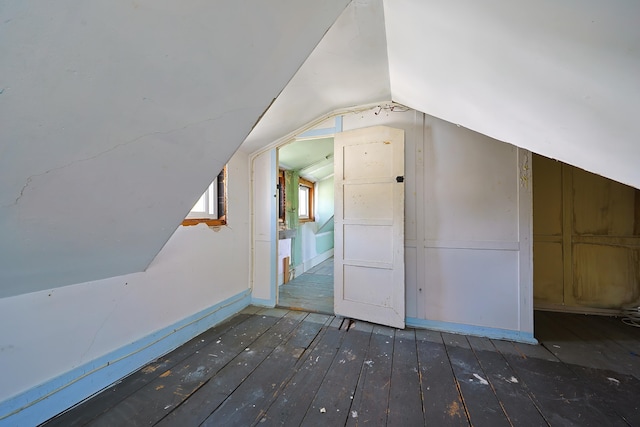 6 Sea St, Northeast Harbor, Mount Desert, ME 04662 - additional living space with wood-type flooring, lofted ceiling, and baseboards