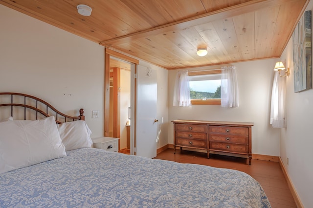 6 Sea St, Northeast Harbor, Mount Desert, ME 04662 - bedroom with baseboards, wooden ceiling, and wood finished floors