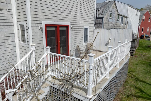 6 Sea St, Northeast Harbor, Mount Desert, ME 04662 - property entrance featuring roof with shingles and fence