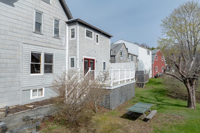 6 Sea St, Northeast Harbor, Mount Desert, ME 04662 - back of property featuring a yard, a deck, and a residential view