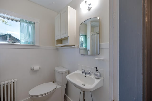 6 Sea St, Northeast Harbor, Mount Desert, ME 04662 - full bath with radiator, plenty of natural light, toilet, and a sink