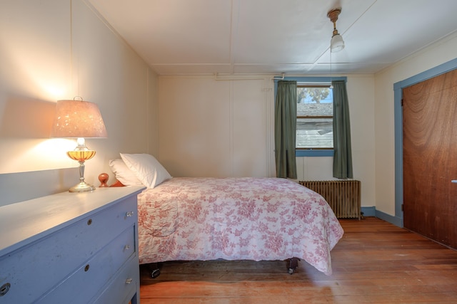 6 Sea St, Northeast Harbor, Mount Desert, ME 04662 - bedroom featuring radiator heating unit and hardwood / wood-style flooring
