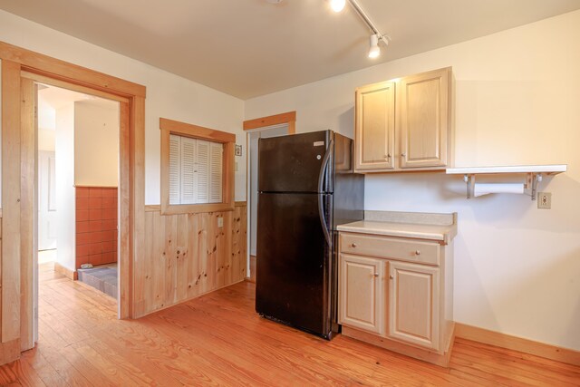 6 Sea St, Northeast Harbor, Mount Desert, ME 04662 - kitchen with freestanding refrigerator, light wood finished floors, a wainscoted wall, light countertops, and rail lighting