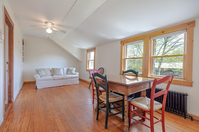 6 Sea St, Northeast Harbor, Mount Desert, ME 04662 - dining room with light wood-style flooring, radiator, baseboards, a ceiling fan, and lofted ceiling