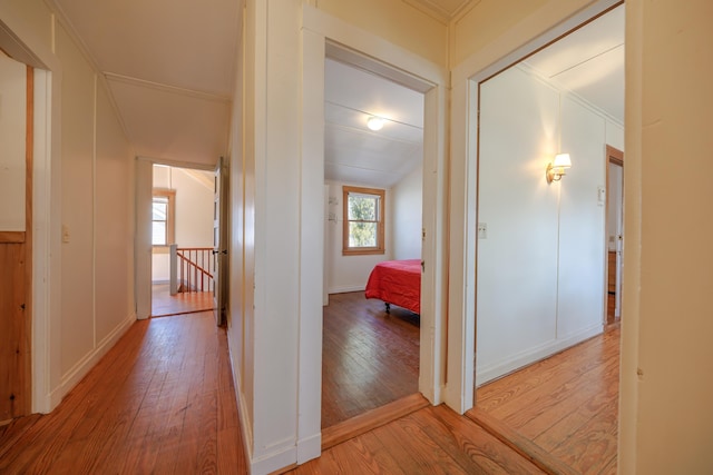 6 Sea St, Northeast Harbor, Mount Desert, ME 04662 - hall with light wood finished floors, ornamental molding, and an upstairs landing
