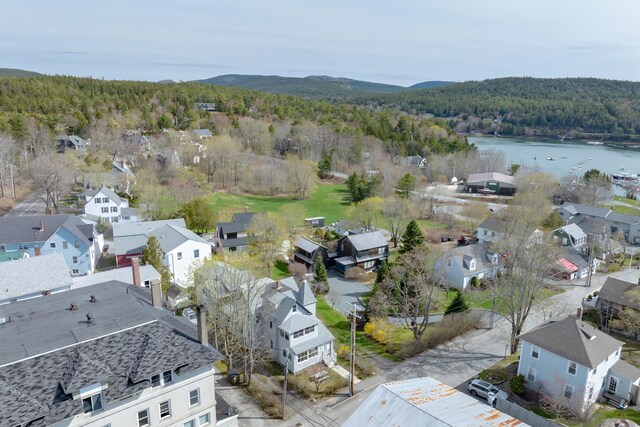 6 Sea St, Northeast Harbor, Mount Desert, ME 04662 - aerial perspective of suburban area featuring a forest and a nearby body of water