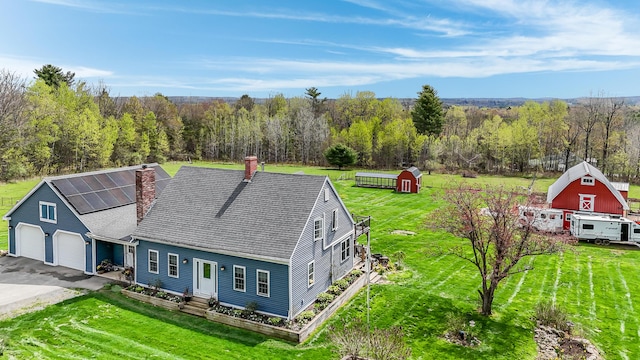 view from above of property featuring a forest
