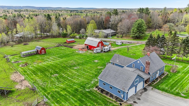 view from above of property with a forest