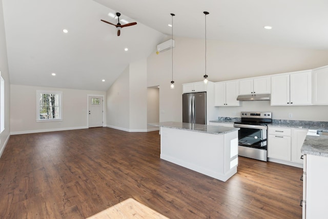 1540 Foxes Ridge Rd, Acton, ME 04001 - kitchen with appliances with stainless steel finishes, under cabinet range hood, high vaulted ceiling, ceiling fan, and a center island
