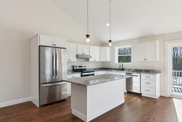 1540 Foxes Ridge Rd, Acton, ME 04001 - kitchen featuring stainless steel appliances, under cabinet range hood, a sink, dark wood finished floors, and light stone counters