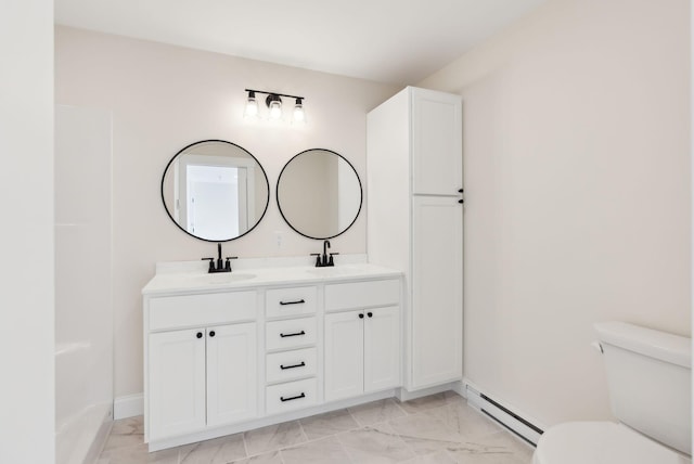 1540 Foxes Ridge Rd, Acton, ME 04001 - full bathroom with a baseboard radiator, marble finish floors, double vanity, toilet, and baseboards