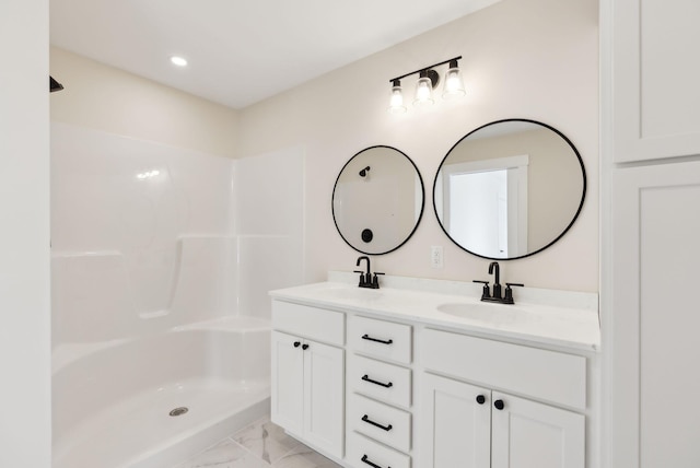 1540 Foxes Ridge Rd, Acton, ME 04001 - full bathroom featuring marble look tiles, double vanity, and recessed lighting