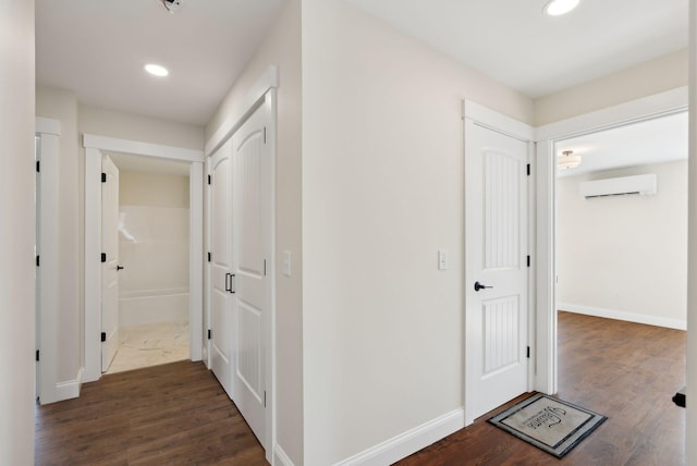 1540 Foxes Ridge Rd, Acton, ME 04001 - hallway with an AC wall unit, recessed lighting, wood finished floors, and baseboards