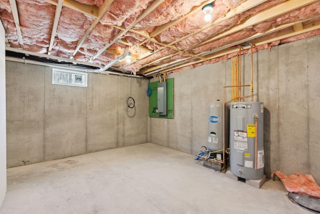 1540 Foxes Ridge Rd, Acton, ME 04001 - basement with water heater, electric panel, and a water pressure tank