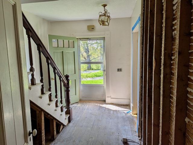 99 W Hamlet Rd, Newcastle, ME 04553 - foyer with stairway and wood-type flooring